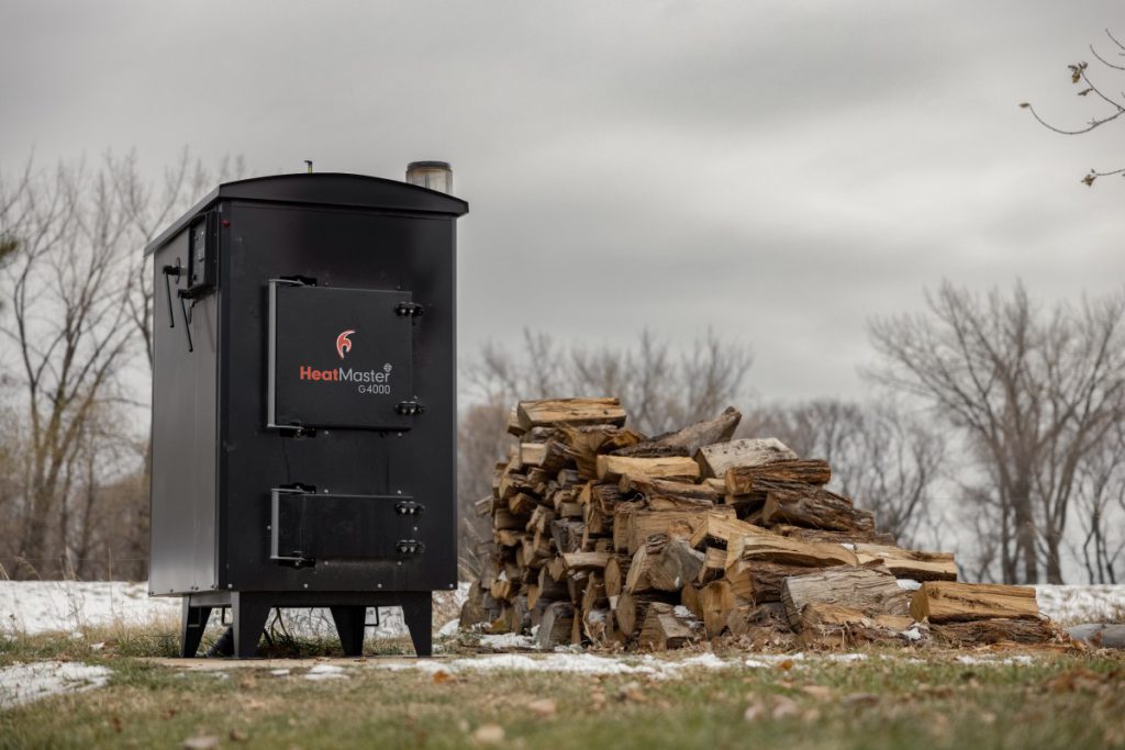 heatmaterss outdoor wood furnace outside during the winter